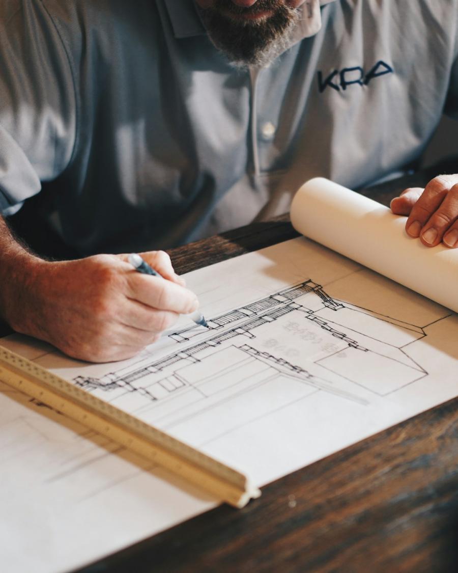Architect drawing construction plans