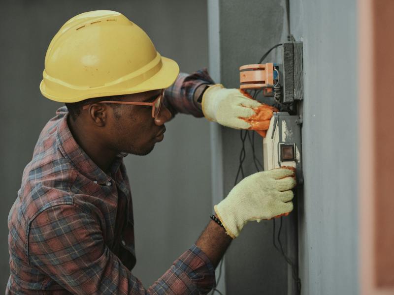 Electrician working on a panel